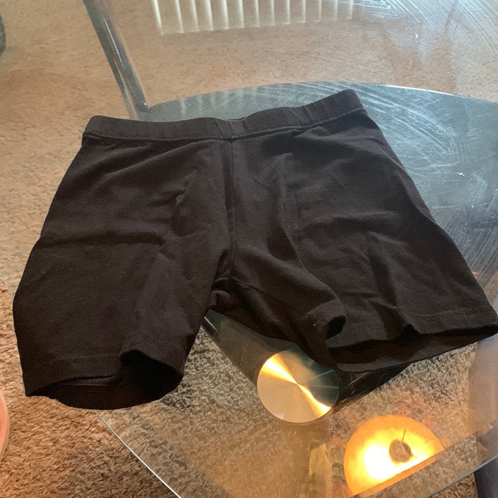 Just some black shorts